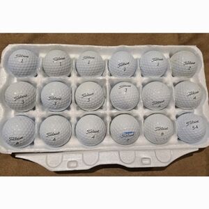 18 Titleist ProV1 white golf balls. Preowned in good condition.
